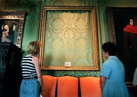 Rembrandt's, 'The Storm on the Sea of Galilee', is just a framed section of fabric wall covering as theses two visitors to the Gardner Museum observed. This was one of the paintings stolen in a mysterious heist that is yet unsolved. 
